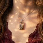 Enchanted Forest Garden Quartz pendant on model, mossy woodland inclusions