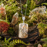 Enchanted Forest Garden Quartz Pendant in white gold vermeil, shown among moss and crystals. Display chain not included.