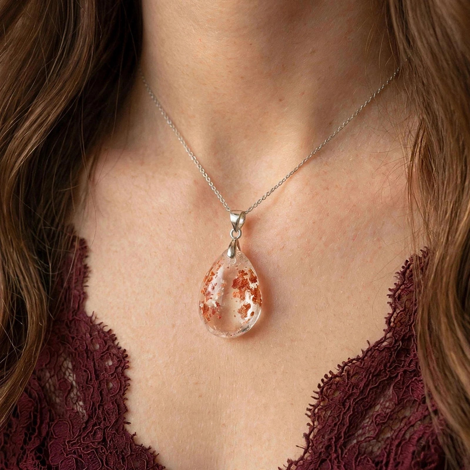 Starlight Petal Garden Quartz pendant on model, delicate petal inclusions