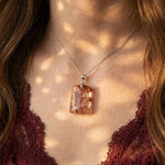 Mystic Glade Garden Quartz pendant on model, 18K white gold vermeil